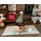 A Christmas elf collectable that has a carved face to light with a battery candle. Bing the elf has a custom pointy hat with faux fur trim.